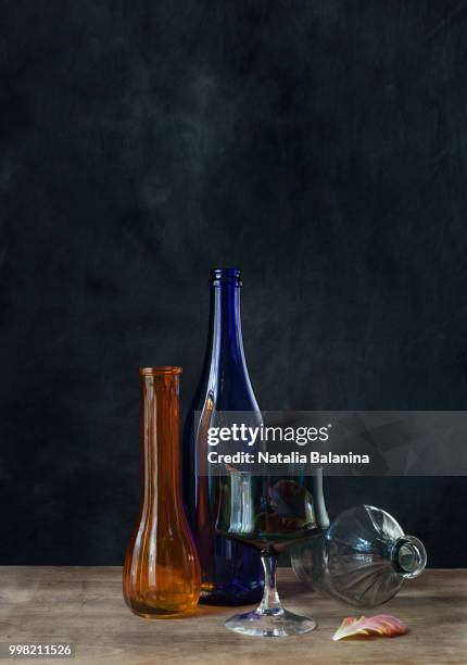 still-life with glas - glas bottle imagens e fotografias de stock