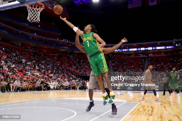 Josh Childress of the Ball Hogs attempts a shot while being guarded by Jason Maxiell of 3's Company during BIG3 - Week Four at Little Caesars Arena...