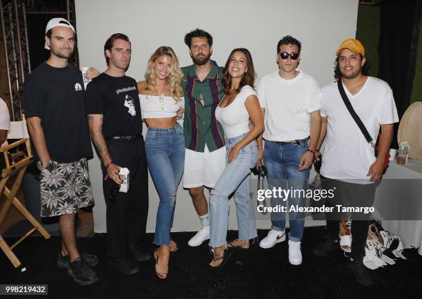 Natasha Oakley and Devin Brugman pose backstage for Monday Swimwear during the Paraiso Fashion Fair at The Paraiso Tent on July 13, 2018 in Miami...