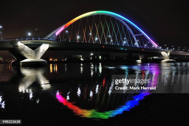 lowry avenue bridge in minneapolis lit in rainbow colors - lowry stock pictures, royalty-free photos & images