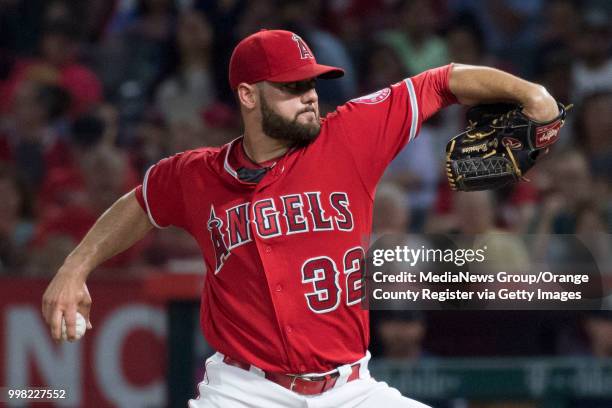 The Los Angeles Angels Cam Bedrosian throws to the plate against the Seattle Mariners in Anaheim on Wednesday, July 11, 2018.