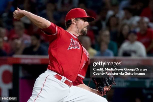 The Los Angeles Angels Deck McGuire throws to the plate against the Seattle Mariners in Anaheim on Wednesday, July 11, 2018.