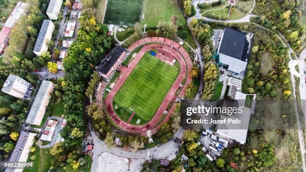 aerial view of football stadium in town, banska bystrica, slovak - banska bystrica stock-fotos und bilder