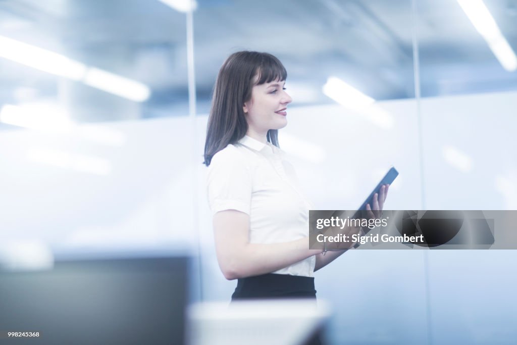 Businesswoman using digital tablet