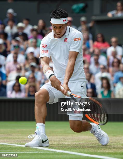 Kei Nishikori of Japan during his quarter-final match against Novak Djokovic of Serbia on day nine of the Wimbledon Lawn Tennis Championships at the...