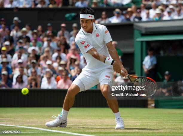 Kei Nishikori of Japan during his quarter-final match against Novak Djokovic of Serbia on day nine of the Wimbledon Lawn Tennis Championships at the...