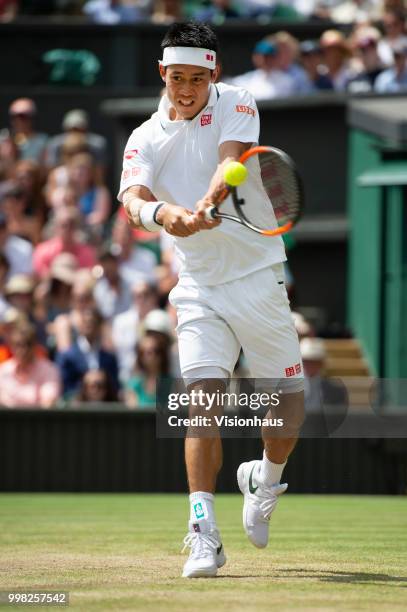 Kei Nishikori of Japan during his quarter-final match against Novak Djokovic of Serbia on day nine of the Wimbledon Lawn Tennis Championships at the...