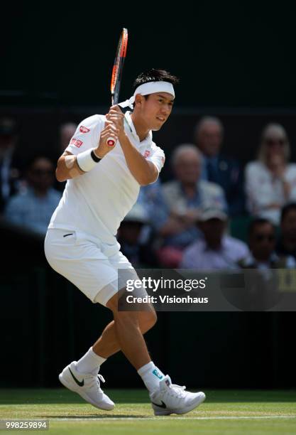 Kei Nishikori of Japan during his quarter-final match against Novak Djokovic of Serbia on day nine of the Wimbledon Lawn Tennis Championships at the...