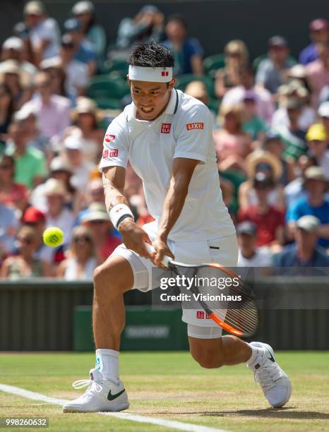 Kei Nishikori of Japan during his quarter-final match against Novak Djokovic of Serbia on day nine of the Wimbledon Lawn Tennis Championships at the...