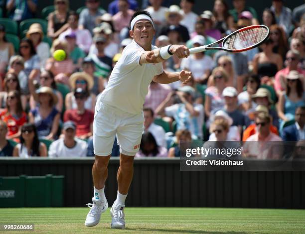 Kei Nishikori of Japan during his quarter-final match against Novak Djokovic of Serbia on day nine of the Wimbledon Lawn Tennis Championships at the...