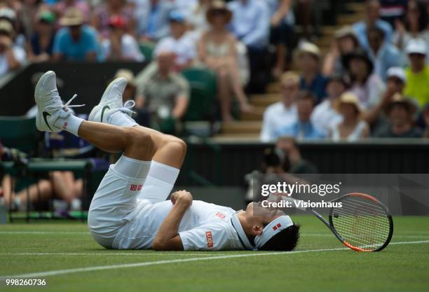 Kei Nishikori of Japan during his quarter-final match against Novak Djokovic of Serbia on day nine of the Wimbledon Lawn Tennis Championships at the...