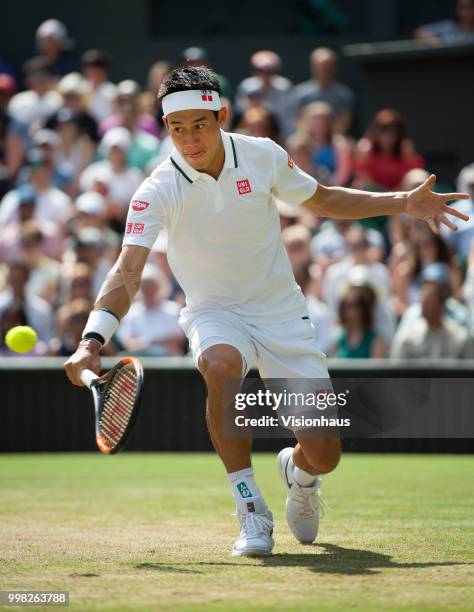 Kei Nishikori of Japan during his quarter-final match against Novak Djokovic of Serbia on day nine of the Wimbledon Lawn Tennis Championships at the...