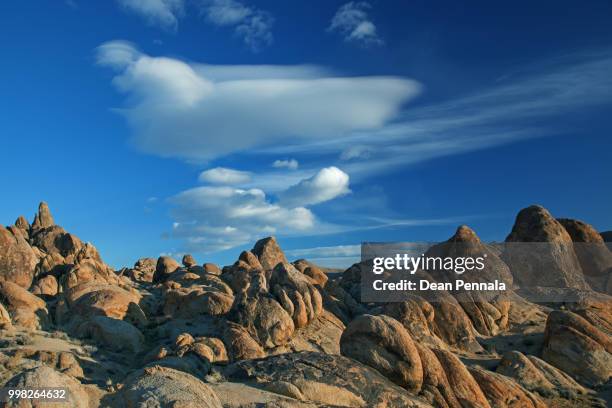 alabama hills and clouds - alabama hills stock-fotos und bilder