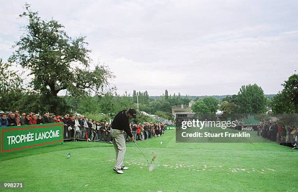 Retief Goosen of South Africa tees off on the 18th hole during the first round of the Lancome Trophy at the St-Nom-la-Breteche Golf Club, Paris,...