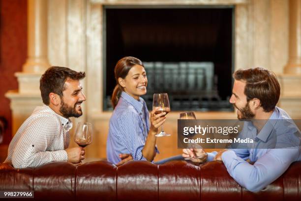 wine time enjoy - chesterfield sofa stock pictures, royalty-free photos & images