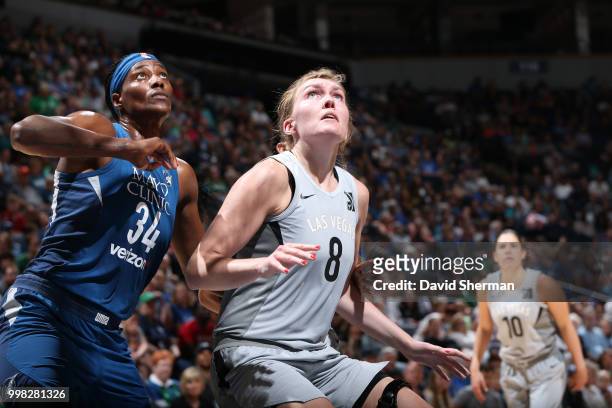 Sylvia Fowles of the Minnesota Lynx and Carolyn Swords of the Las Vegas Aces wait for the ball on July 13, 2018 at Target Center in Minneapolis,...