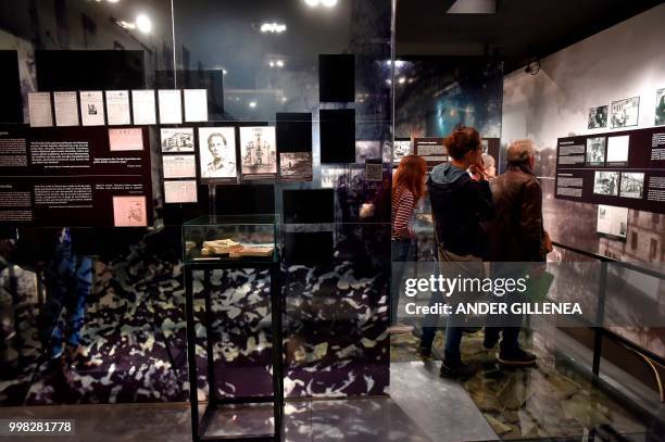 People visit the Peace Museum in the Spanish Basque village of Guernica on May 4, 2018. - In Spain, the issue of remembrance is especially relevant...