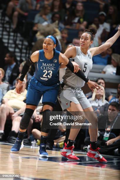 Maya Moore of the Minnesota Lynx and Dearica Hamby of the Las Vegas Aces wait for the ball on July 13, 2018 at Target Center in Minneapolis,...