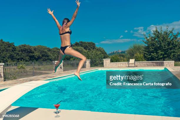 summer in the pool - tempio pausania stock pictures, royalty-free photos & images