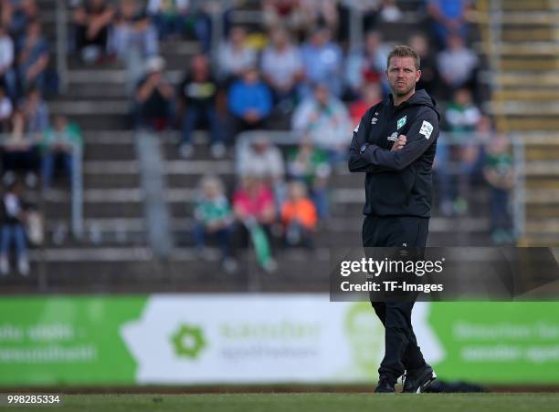 Head coach Florian Kohfeldt of Werder Bremen looks on during the friendly match between FC Eintracht Cuxhaven and Werder Bremen on July 10, 2018 in...