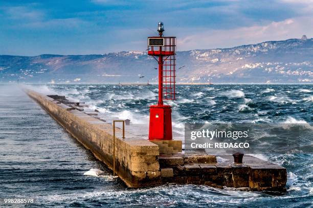 Trieste city and the Adriatic Sea during the wind phenomenon called Bora. Friuli-Venezia Giulia. Italy. Europe. Photo by: Carlo...