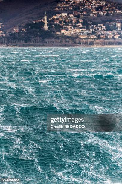 Trieste city and the Adriatic Sea during the wind phenomenon called Bora. Friuli-Venezia Giulia. Italy. Europe. Photo by: Carlo...
