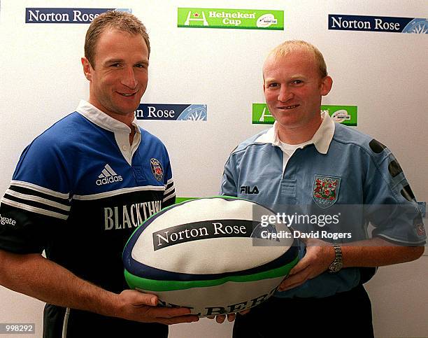 Neil Jenkins of Cardiff and Mike Catt of Bath pose at a photocall in Broadgate Circle in London to announce that Intrnational law firm Norton Rose...