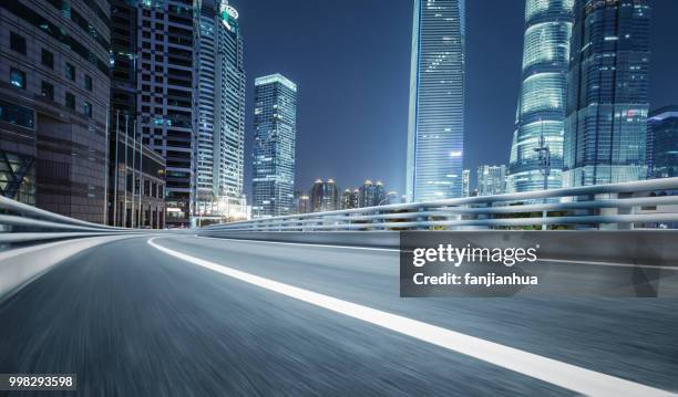 inner city elevated road by modern skyscrapers,shanghai - empty road stock pictures, royalty-free photos & images