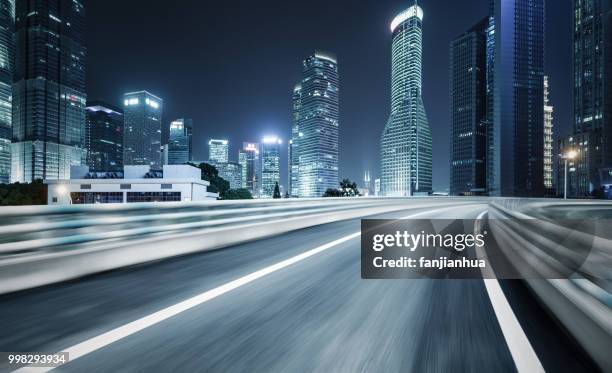 inner city elevated road by modern skyscrapers,shanghai - empty road stock pictures, royalty-free photos & images