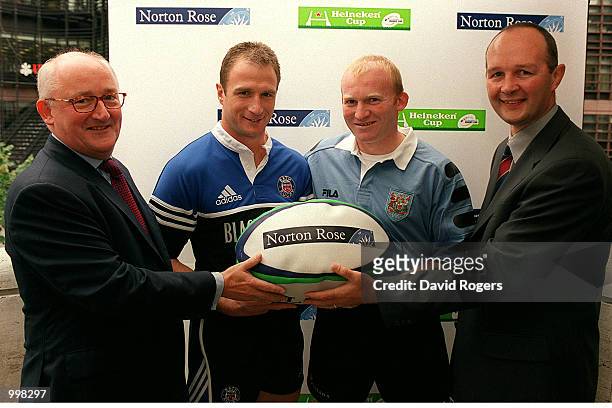 Neil Jenkins of Cardiff and Mike Catt of Bath pose with Roger Birkby, Managing Partner of International law firm Norton Rose and Derek McGrath,...