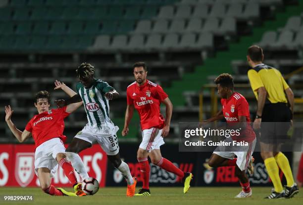 Vitoria Setubal forward Valdu Te from Guinea Bissau with SL Benfica defender German Conti from Argentina in action during the Pre-Season Friendly...