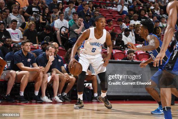 Devon Hall of the Oklahoma City Thunder handles the ball during the game against the Orlando Magic during the 2018 Las Vegas Summer League on July...