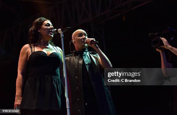 Joanne Catherall and Philip Oakey of The Human League perform on stage during Day 4 of Kew The Music at Kew Gardens on July 13, 2018 in London,...