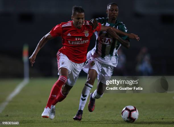 Benfica defender Tyronne Ebuehi from Nigeria with Vitoria Setubal forward Leandro Resinda from Netherlands in action during the Pre-Season Friendly...