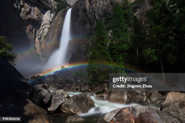 double moonbow of lower yosemite fall - moonbow photos et images de collection