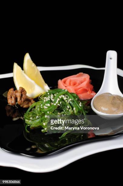 chuka seaweed salad with sesame and peanut sauce - chuka stock pictures, royalty-free photos & images