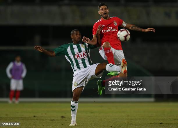 Benfica defender Lisandro Lopez from Argentina with Vitoria Setubal forward Allef from Brazil in action during the Pre-Season Friendly match between...