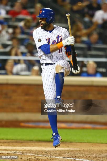 Jose Bautista of the New York Mets reacts after striking out in the sixth inning against the Washington Nationals at Citi Field on July 13, 2018 in...