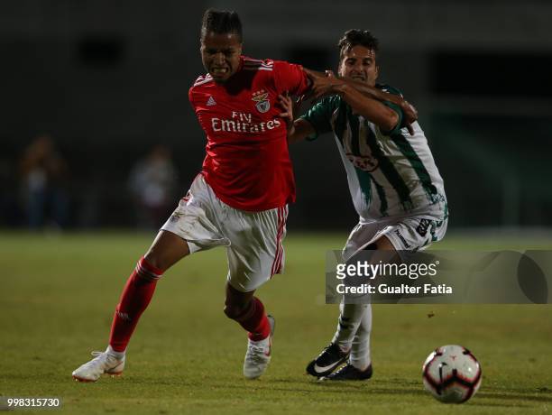 Benfica defender Tyronne Ebuehi from Nigeria with Vitoria Setubal forward Alex Freitas from Portugal in action during the Pre-Season Friendly match...