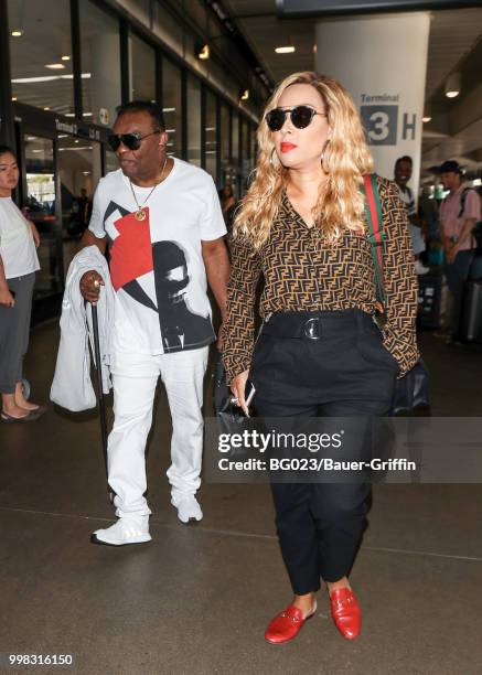 Ronald Isley and his wife, Kandy are seen on July 13, 2018 in Los Angeles, California.