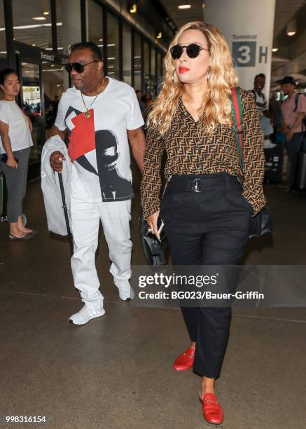 Ronald Isley and his wife, Kandy are seen on July 13, 2018 in Los Angeles, California.