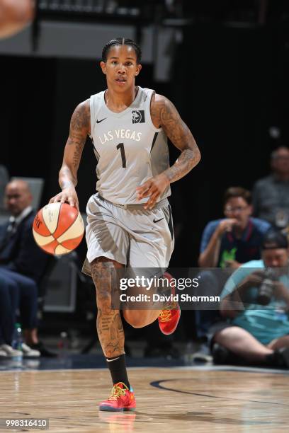 Tamera Young of the Las Vegas Aces handles the ball against the Minnesota Lynx on July 13, 2018 at Target Center in Minneapolis, Minnesota. NOTE TO...