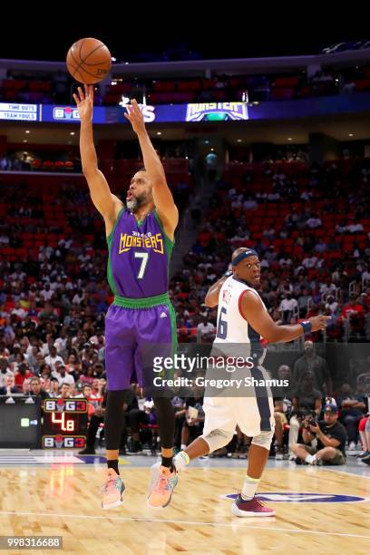 Mahmoud Abdul-Rauf of the 3 Headed Monsters attempts a shot past Bonzi Wells of Tri-State during BIG3 - Week Four at Little Caesars Arena on July 13,...