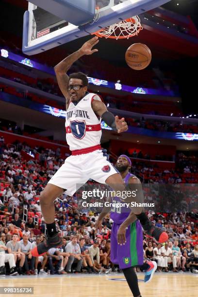 Amar'e Stoudemire of Tri-State dunks the ball past Reggie Evans of the 3 Headed Monsters during BIG3 - Week Four at Little Caesars Arena on July 13,...