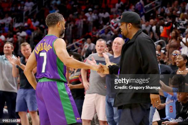 Mahmoud Abdul-Rauf of the 3 Headed Monsters celebrates with Ice Cube during the game against Tri-State during BIG3 - Week Four at Little Caesars...
