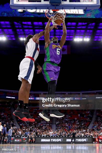 Qyntel Woods of the 3 Headed Monsters dunks the ball past Amar'e Stoudemire of Tri-State during BIG3 - Week Four at Little Caesars Arena on July 13,...