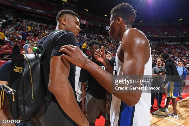 Giannis Antetokounmpo of the Milwaukee Bucks and Kostas Antetokounmpo of the Dallas Mavericks talk after the game against the Golden States Warriors...