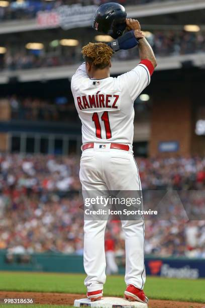 Cleveland Indians third baseman Jose Ramirez stands on third base during a pitching change during the fifth inning of the Major League Baseball game...