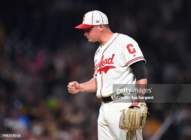 Kyle Crick of the Pittsburgh Pirates celebrates a 7-3 win over the Milwaukee Brewers at PNC Park on July 13, 2018 in Pittsburgh, Pennsylvania. Both...