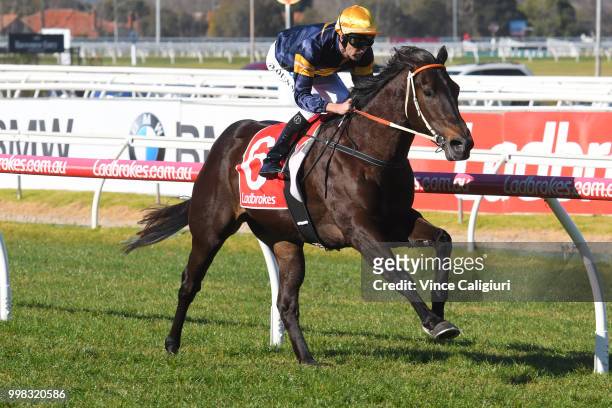Dwayne Dunn riding Brutal winning Race 1 during Melbourne Racing at Caulfield Racecourse on July 14, 2018 in Melbourne, Australia.